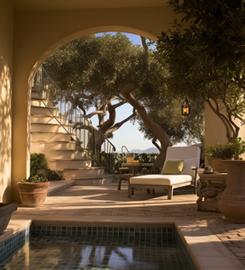 A beautiful spa image featuring a pool, archway, lounge chair, trees and decorative staircase. 